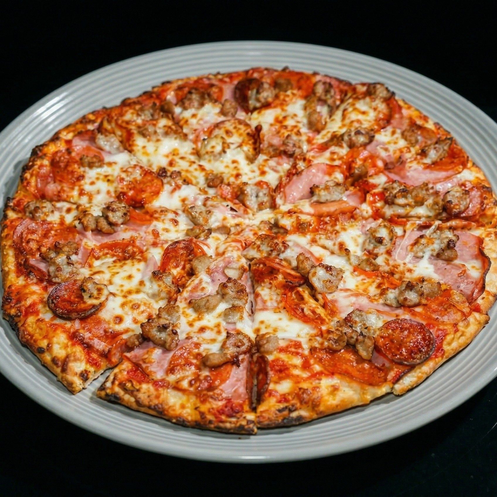 Large Meatsanity Pizza.