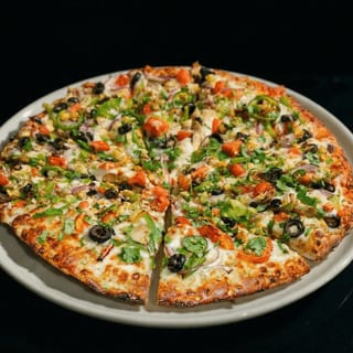 Small Indian Style Veggie Pizza