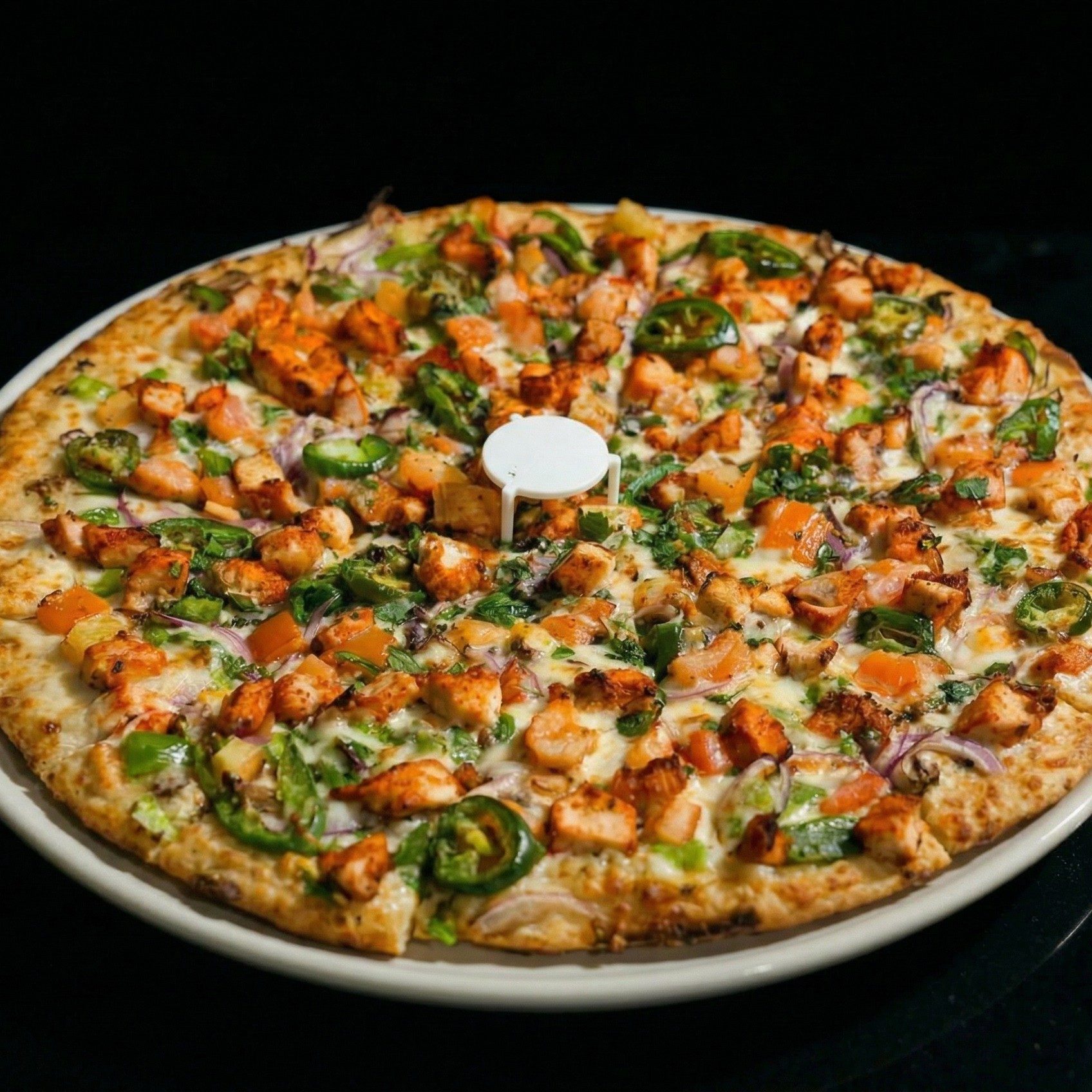 Large Tandoori Tikka Pizza.